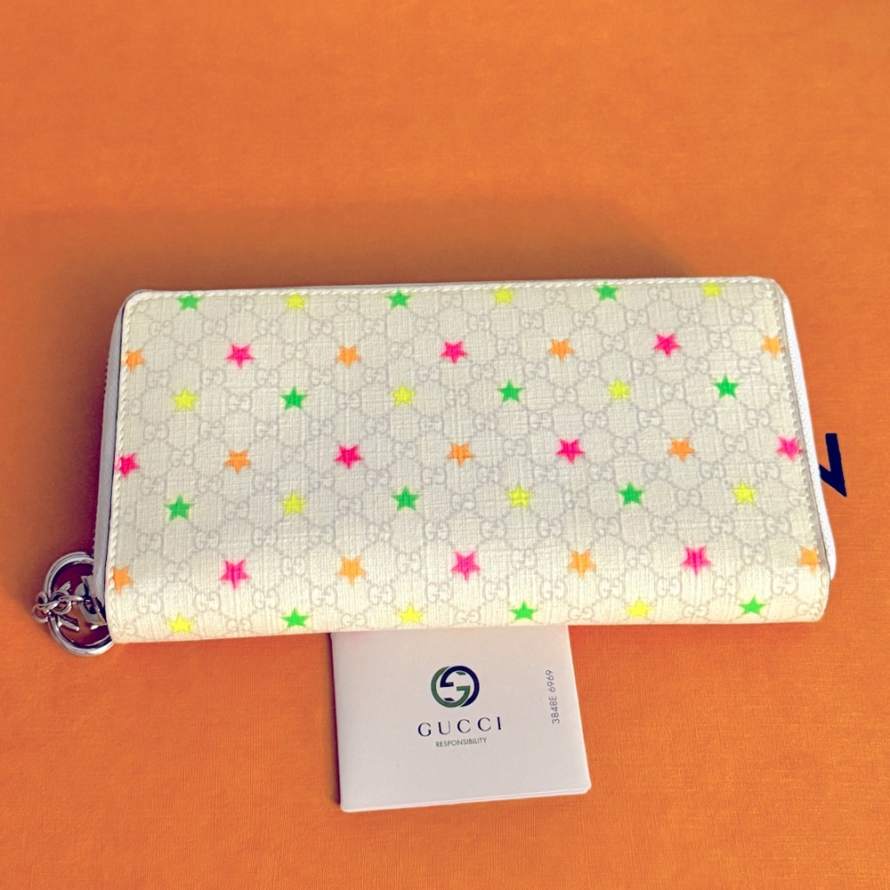 Gucci Micro GG Supreme Neon Star Zip
Around Wallet NWOT
